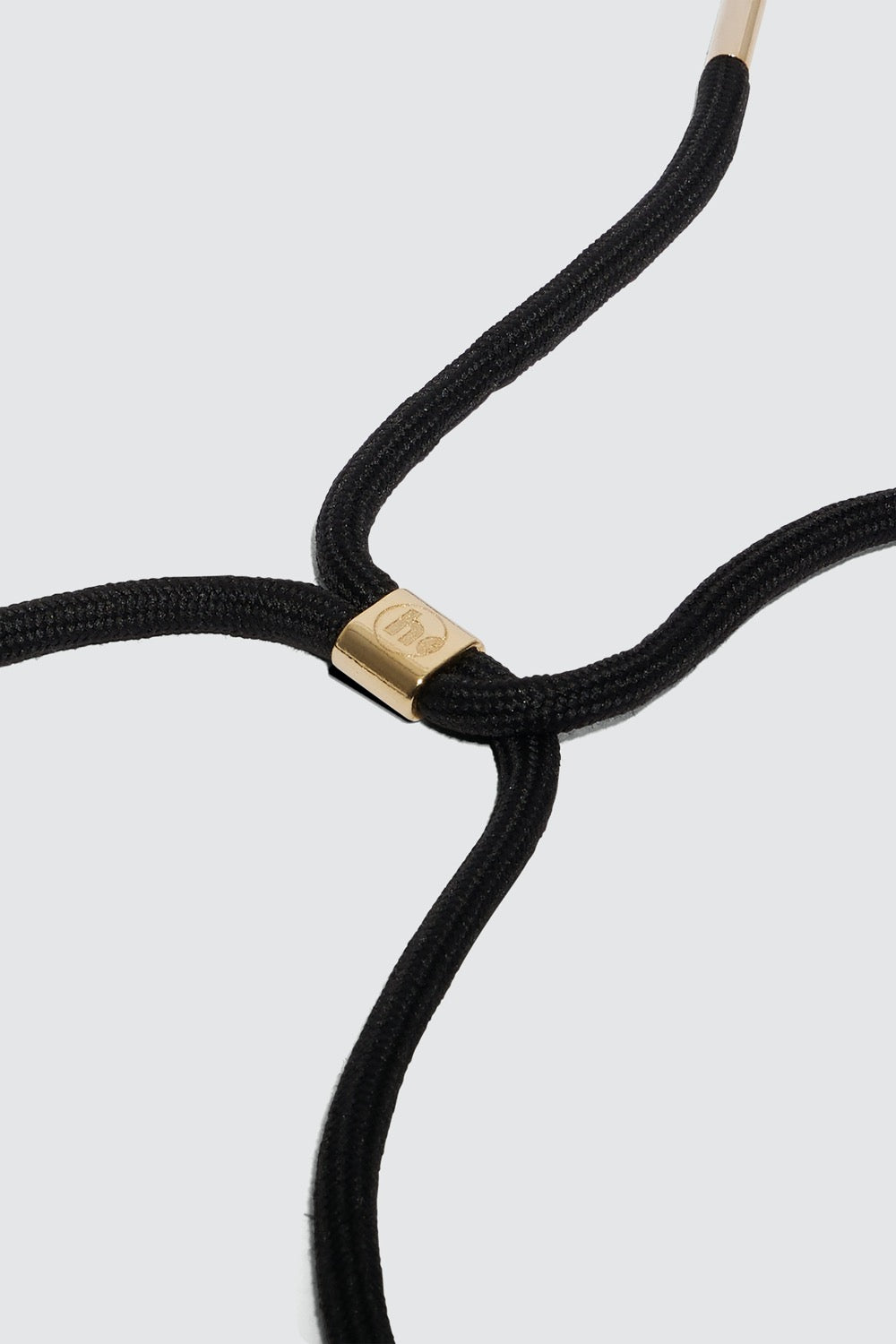 Gold and black phone strap