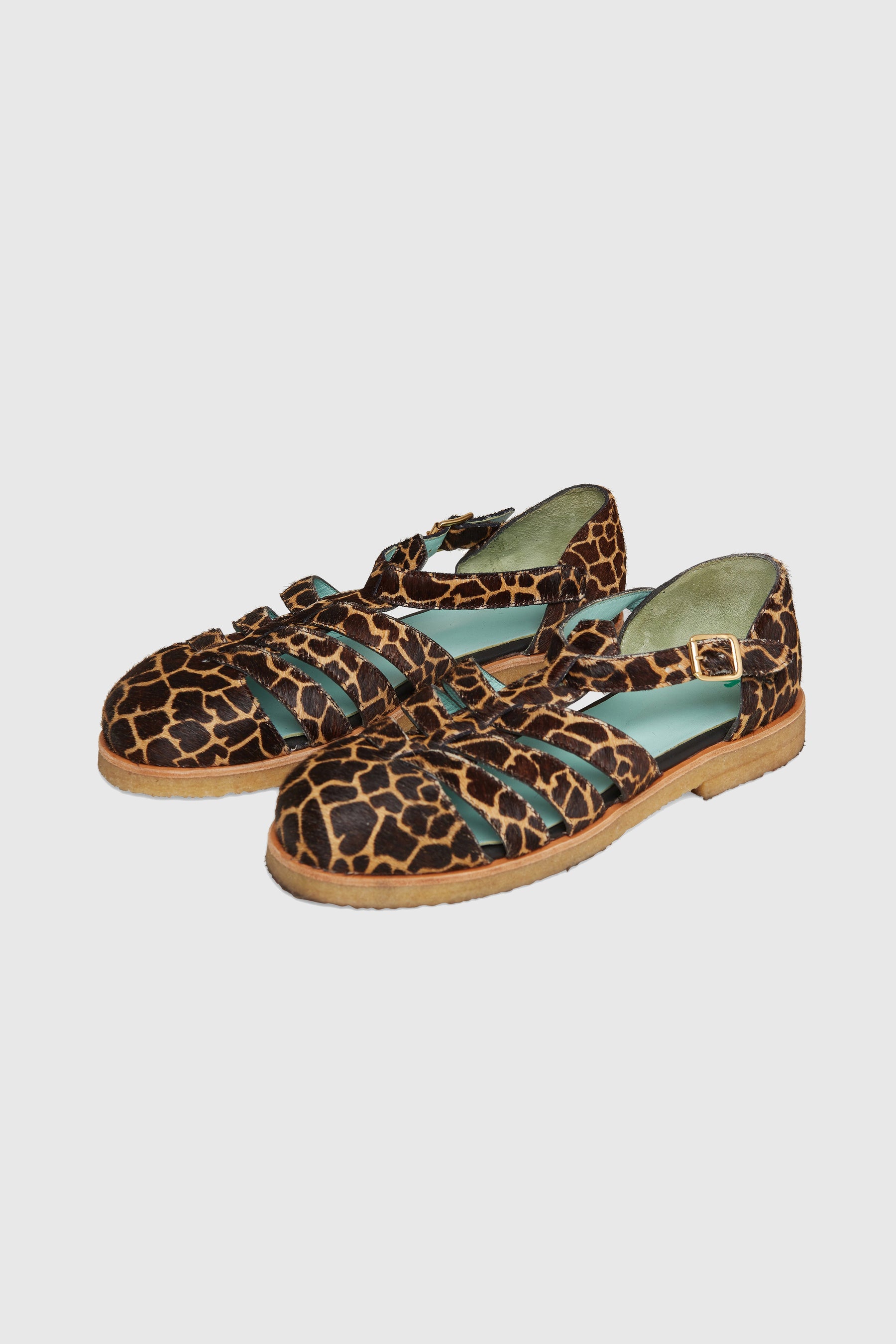 Ricky sandals in giraffe printed leather