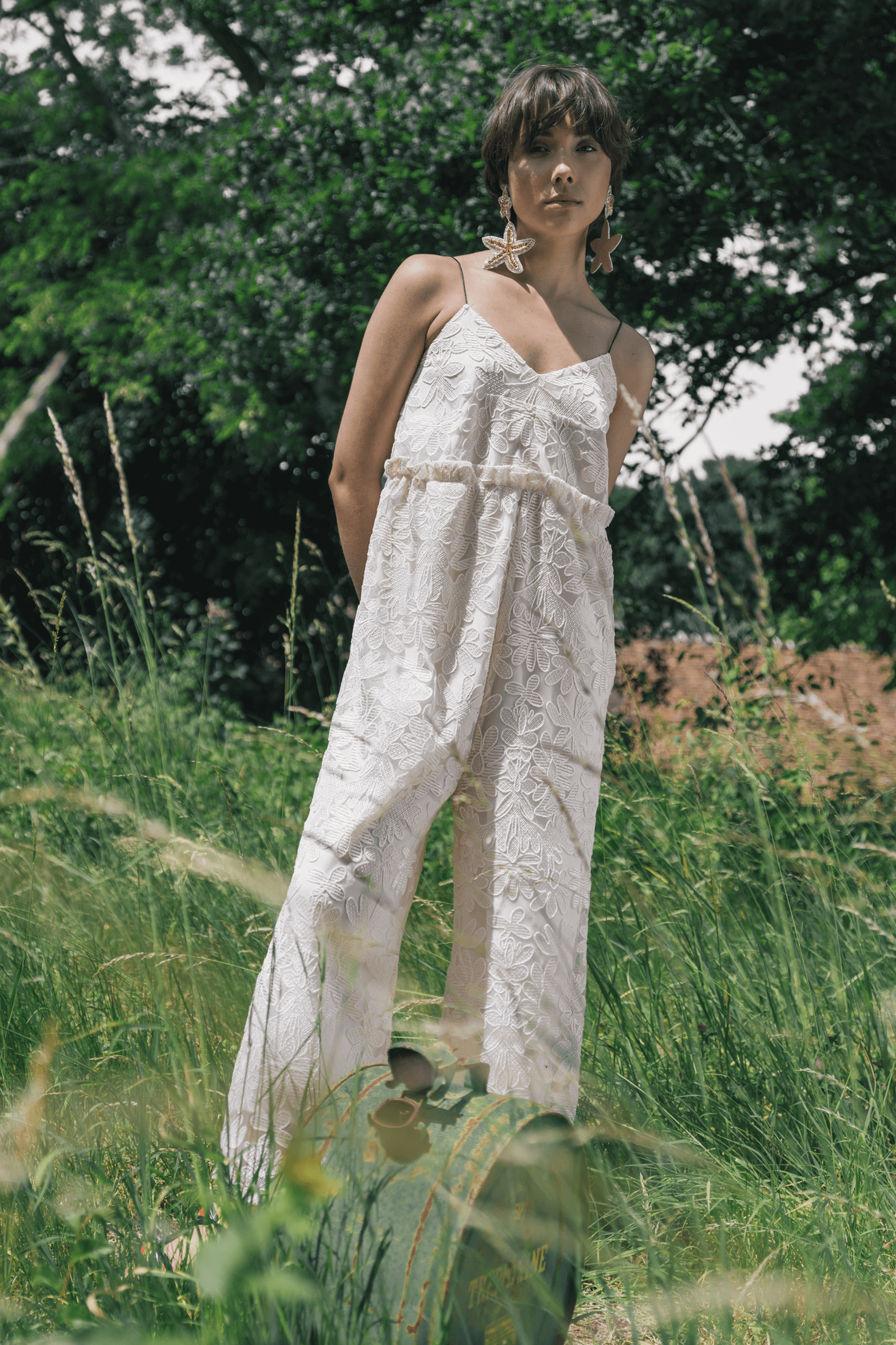 Lottie jumpsuit in Daisy lace