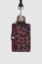 Les Minis - Porte-clé à clapet en cuir imprimé léopard bordeaux