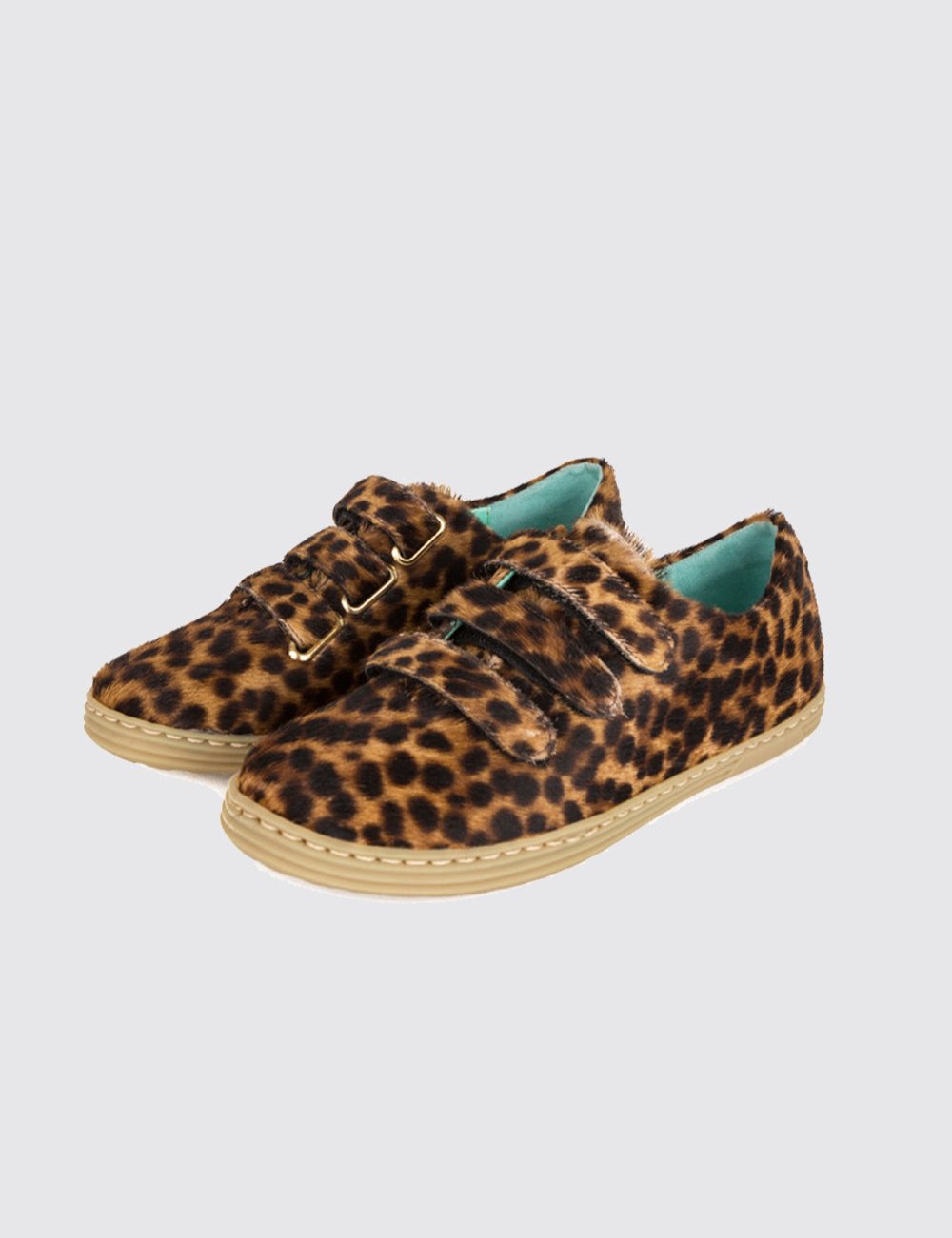 Sneakers in leopard printed leather